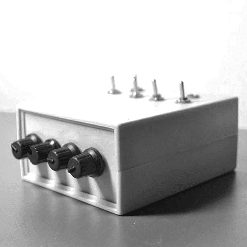 An image of a complete noise machine in a white enclosure